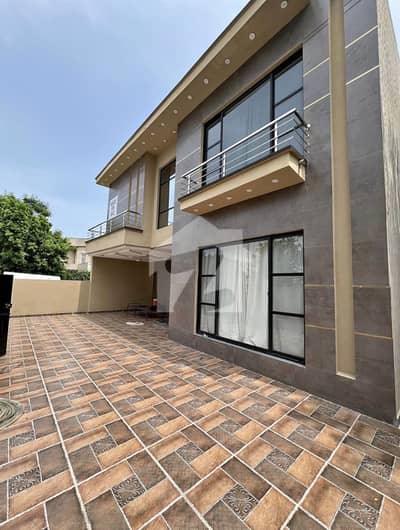Ultra-Modern 1-Kanal Designer Home In DHA Phase 3 Near Packages Mall