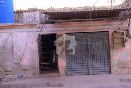 Already Rented Boundary Wall Commercial Shed Plot Prime 200 Sq. Yards Leased Commercial Plot For Sale In Sector 11-D, Orangi Town Karachi Ideal For Commercial / Factory Use.