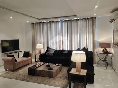 Luxury 2-Bed Fully Furnished Apartment In Gulberg III Prime CBD Location Ideal For Families & Overseas Clients