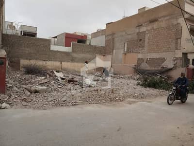100 SQYD RESIDENTIAL PLOT AVAILABLE FOR SALE IN MODEL COLONY SHEET 22 OPPOSITE SAEED SUPER STORE