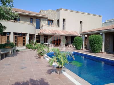 Luxurious 2000 Yards Bungalow with Pool Prime Phase VI Near Khyaban-e-Hafiz!
