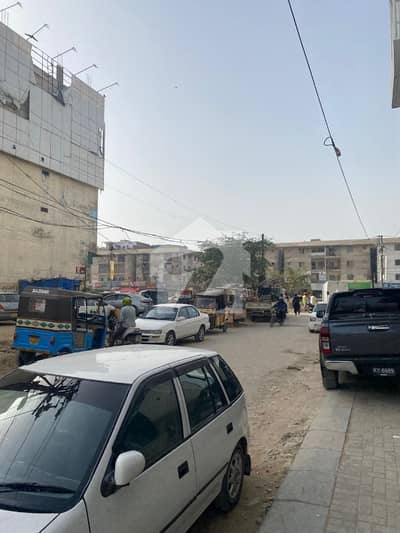 PRIME LOCATION 3 SIDE CORNER COMMERCIAL S. B 400 SQUARE YARD PLOT VAILABLE FOR SALE IN MAIN UNIVERSITY ROAD BLOCK 7 GULISTAN E JAUHAR KARACHI
