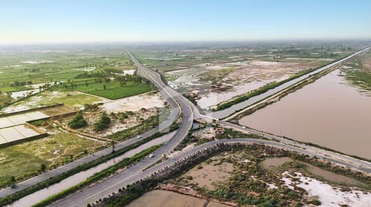 کینال ایکسپریس فیصل آباد میں 32 کنال کمرشل پلاٹ 56.0 کروڑ میں برائے فروخت۔