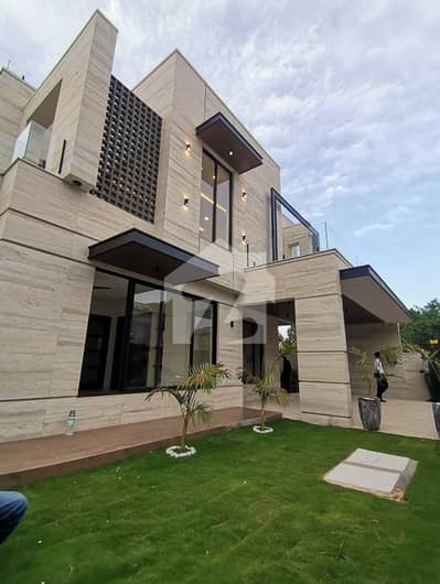 1 Kanal Brand New Designer And Stylish House Up For Sale In Dha2 Islamabad.