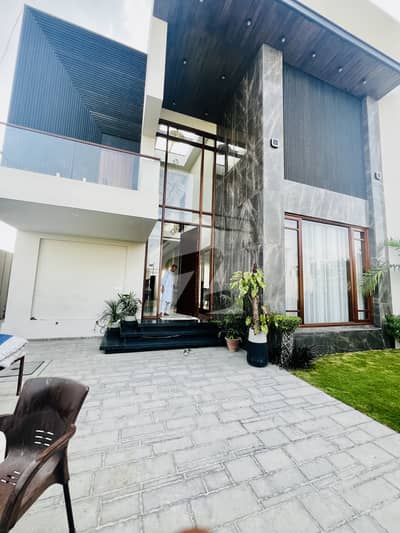 DHA PHASE 8 500 SQARE YARD BRAND NEW BUNGALOW 1+4 BEDROOM FULL FURNISHED WITH SWIMMING POOLS BASEMENT AWAY FROM SEA TOP OF THE LIEN BUNGALOW