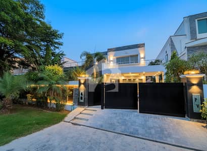 One Kanal Independent Modern Bungalow Premium Location Adjacent To The Sports Complex & Swimming Pool.