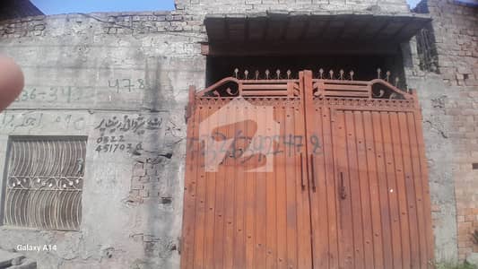 10 marla corner plot with 2 side streets and 50 feet main road access. Located near Ring Road in a prime and fast-growing location.
