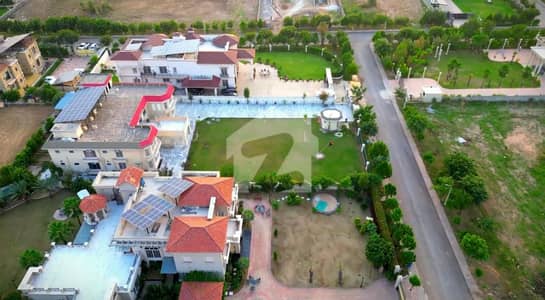 A Rare Chance! 4 Kanal Farmhouse Plot in Gulberg Greens B-Block up For Sale - The Epitome of Luxury Living.