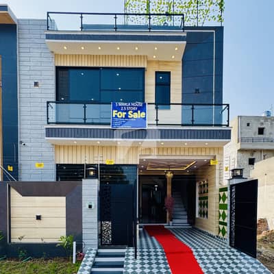 5 Marla house with rooftop sitting area