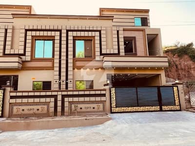 10 Marla Brand New Triple Unit House Available For Sale .
