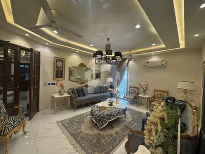 Luxurious Fully Furnished 1-Kanal Modern Bungalow with Full Basement in DHA Phase 5  4 Bed Elegant Living, Prime Location & Motivated Seller Deal by Wall Green Realtors