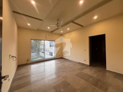 Elegant 1-Kanal Double Unit House For Rent in DHA Phase 7, 6 Master Bedrooms with Attached Bathrooms, 3 Kitchens, TV Lounges, Drawing & Dining, Store Room, Powder Room Perfect Family Home Easy Deal by Wall Green Realtors