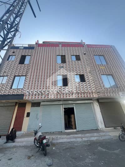 3 MARLA COMMERCIAL 4 STORY BUILDING ( ALMOST NEW ) FOR SALE IN AL MADINA AVENUE MAIN COLLEGE ROAD LAHORE