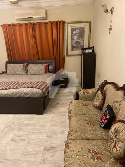 Fully Furnished Room In Bangalow For Rent Phase 5 Beautiful Room With Attached Washroom Shared Kitchen Common Area. Car Parking With Camera Security Available