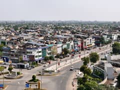 100 FT Road 8 Marla Commercial Plot for Sale in CCA1 DHA Phase 7 Lahore No DP No Pole Road Level Surrounded by Buildings