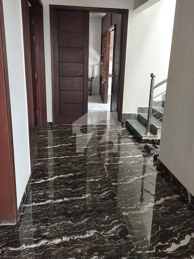 P-4 Villa. In Bahria Town . 500 Sq Yards One Unit House . 5 Bedrooms . 2 Kitchen. 2 Lounges, Drawing Room And Dining Room. 2 Stores Beautiful Green Lawn . 10 K. V. A. Solar On-Gride. Marble On The Roof Top. West Open. Near Park. Call Direct Owner