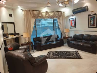 1 KANAL ELEGANT AND FULLY MAINTAINED SUPER HOT LOCATED BUNGALOW IS AVAILABLE IN THE BEST BLOCK OF DHA LAHORE.