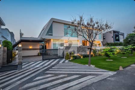 2 KANAL ELEGANT AND FULLY MAINTAINED FURNISHED BUNGALOW WITH BASEMENT & SWIMMING POOL IS AVAILABLE IN THE BEST BLOCK OF DHA LAHORE