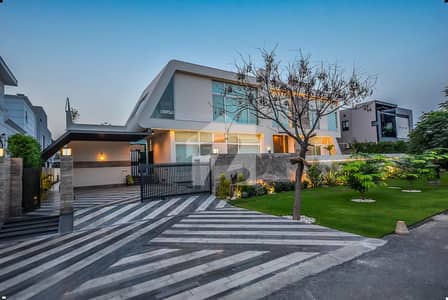 2 KANAL ELEGANT AND FULLY MAINTAINED FURNISHED BUNGALOW WITH BASEMENT & SWIMMING POOL IS AVAILABLE IN THE BEST BLOCK OF DHA LAHORE