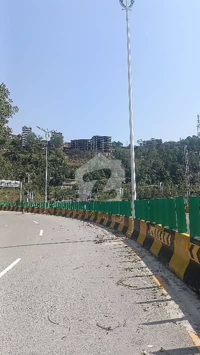 1 Kanal Plot With 1 Kanal Access Land In Main Express Way Murree