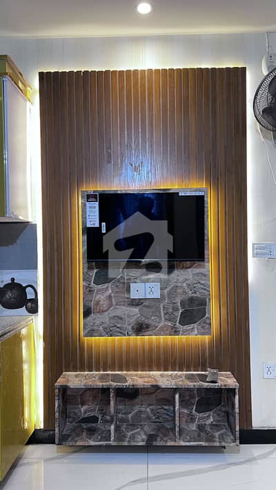 Brand New 2 Bed Full Furnished Flat For Sale 80K Rental Value All Electronics Available Brand New Plaza CDA Approved Security Cameras Lift 24/7 Water 24/7 Sollar Backup Biometric Lock System