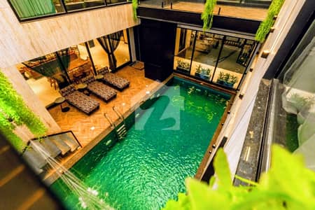 1 KANAL ULTRA LUXURY TOP-NOTCH BUNGALOW WITH SWIMMING POOL & FULL BASEMENT | DHA PHASE 6 | 70 FT ROAD | NEAR DOLMEN MALL | 100% ORIGINAL DEAL