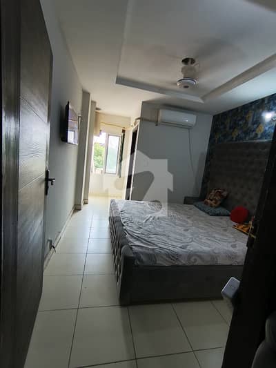 E-11/2 crown business center one bedroom apartment fully furnished available for rent.