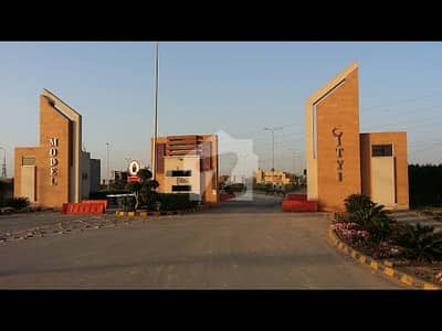 05 Marla Premium Location Plot For Sale in D-Block, Model City 1, Canal Road , Faisalabad.