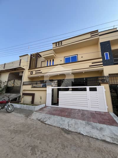 Brand New 6 Marla 1.5 Story House For Sale 3 Bed, 2 Kitchens Big 2-Car Parking Porch.