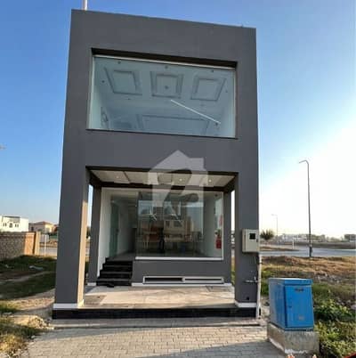 2 MARLA COMMERCIAL BUILDING FEASING 150 FeeT ROAD IN DHA PHASE 8