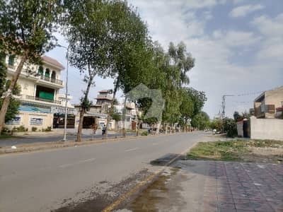 Prime Location 1 Kanal Commercial Plot Is Available On 80 Feet Main Road - Ideal For School Or Bank