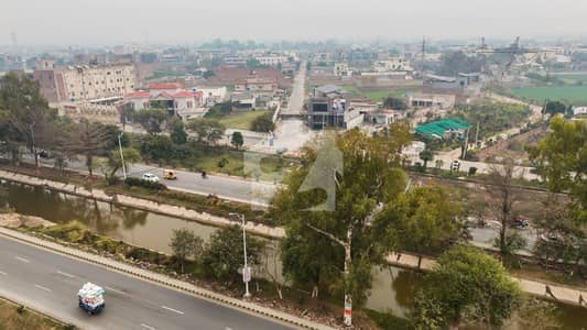 2.5 Marla Commercial Plot For Sale in Raya Canal Faisalabad Near Babu CNG 2, City Walk, Market Place 204, Gatalwala
