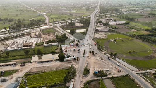 کینال ایکسپریس فیصل آباد میں 22 کنال کمرشل پلاٹ 23.0 کروڑ میں برائے فروخت۔