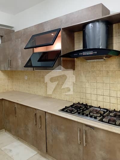 10 Marla 3 Bedrooms New Design Flat Available For Sale.