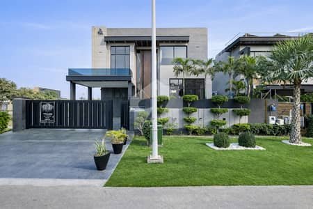 Elegant One Kanal Premium Quality Constructed Modern Luxury Bungalow Available For Sale In Phase 7 Prime Location With Outstanding Architecture And High-End Finishing.
