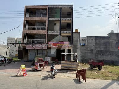 Centrally Located Prime Location Building In Al-Ahmad Garden Housing Scheme Is Available For sale