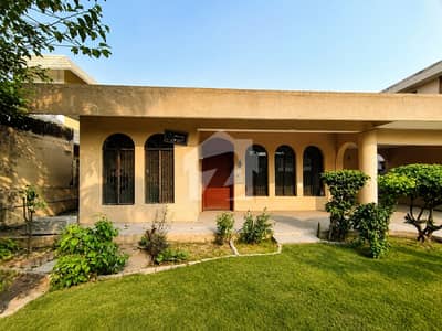 1 Kanal Single Storey House For Sale in DHA Phase 1 K Block Priced at Plot Value