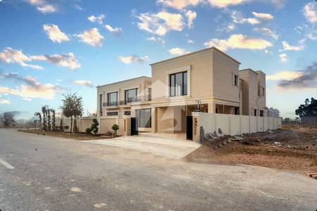 2 KANAL ELEGANT SUPER HOT LOCATED CORNER BRAND NEW BUNGALOW IS AVAILABLE IN THE BEST BLOCK OF DHA LAHORE.