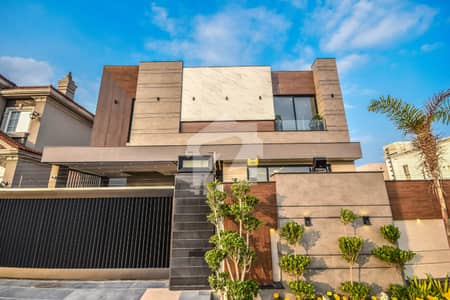 ONE KANAL DESIGNER HOUSE FULL BASEMENT WITH CENIMA NEAR DOLMEN MALL DHA PHASE 6