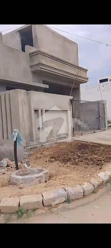 Gray structure single story house corner for sale