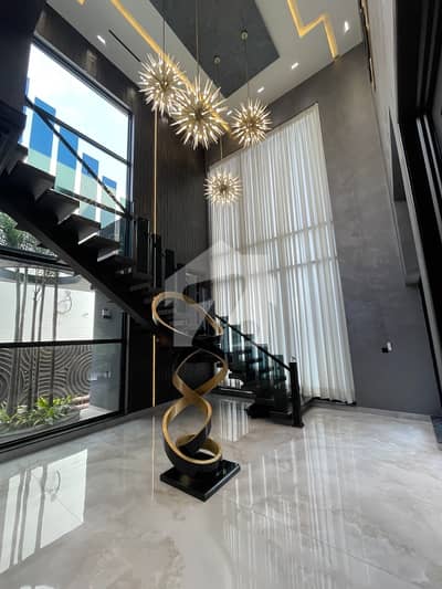 One Kanal Brand New Modern Designer House At Very Good Location.