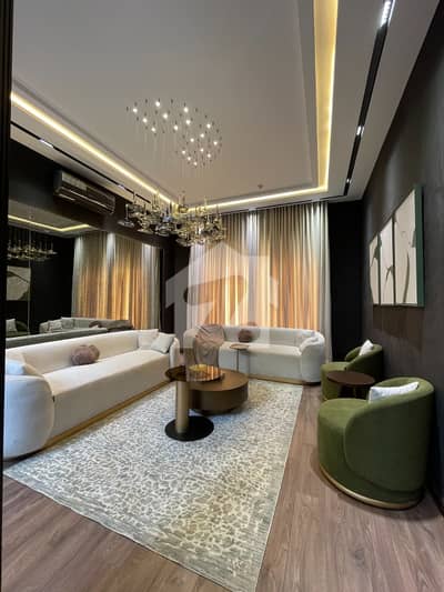 One Kanal Brand New Modern Designer House At Very Good Location.