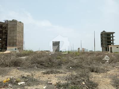 100 Sq Yards Corner Plot Located In Tariq Commercial Area, Parking Corner, DHA Phase-7 Ext. .