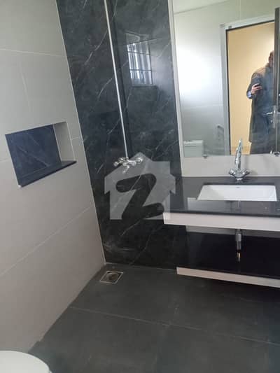 A beautiful upper portion for rent ideal location All tile flooring
