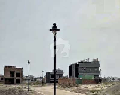 Prime Location 7 Marla Corner Sun Facing Plot Adjacent To Park And Main Boulevard