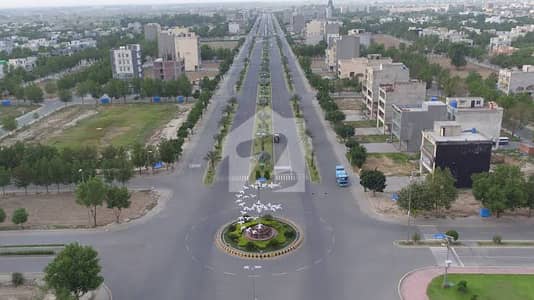 2 kanal commercial plot E Block 150ft road johar town allah hoo Gol chakar ideal location