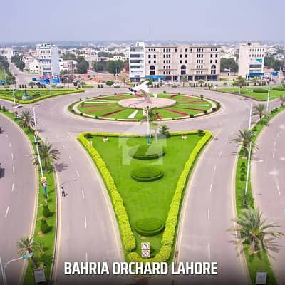 4 marla commercial plot J Block 150ft road best for plaza ideal location
