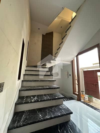 100YARDS MOST LUXURIOUS AND ARCHITECTURE ULTRA MODERN STYLE DOUBLE STORY BRANDNEW BUNGALOW FOR SELL IN DHA PHASE 7 EXT WITH FULL BASEMENT