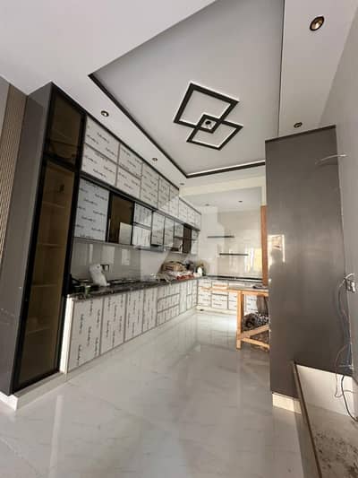 100 YARDS MOST LUXURIOUS AND ARCHITECTURE ULTRA MODERN STYLE DOUBLE STORY BRANDNEW BUNGALOW FOR SELL IN DHA PHASE 7 EXT WITH FULL BASEMENT