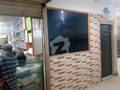 Shop For Sale On Main Shahrah-E-Faisal Building